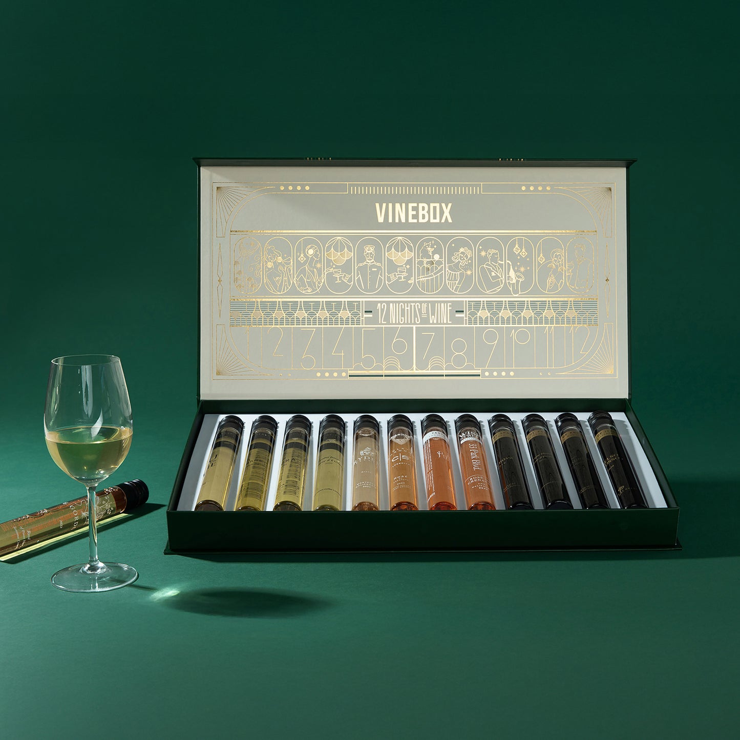 Vinebox wine tasting set with wine glasses on a green background