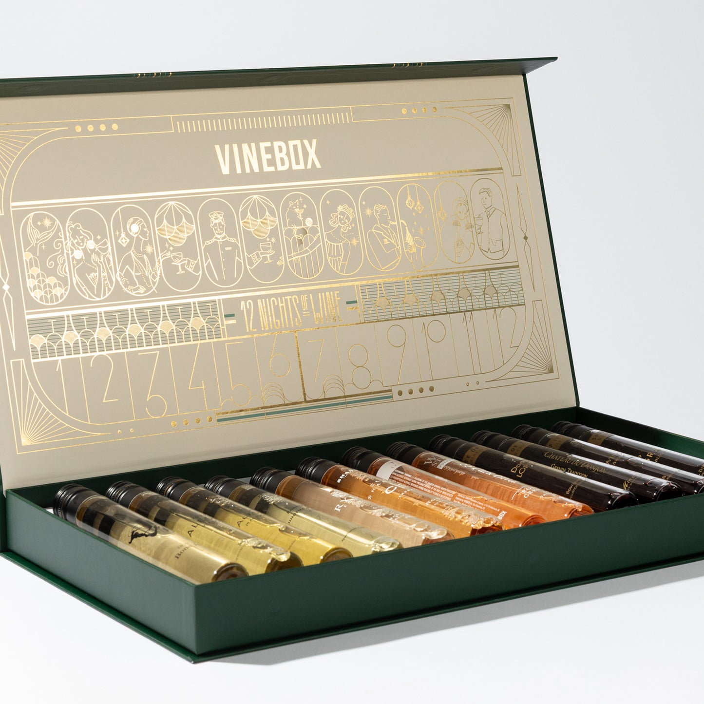Open Vinebox box with various bottles inside on a white background