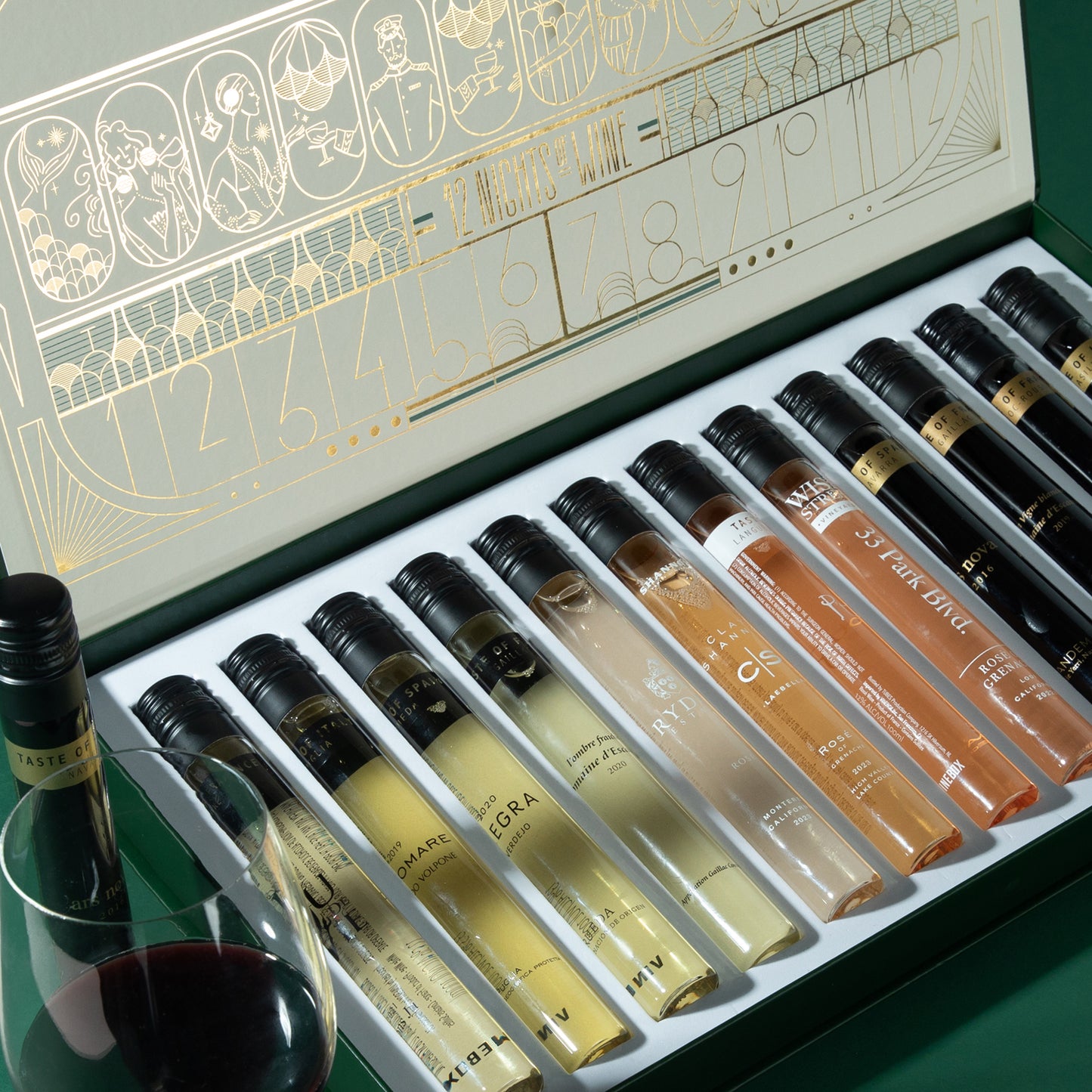 Set of wine samples in a decorative box with ancient Egyptian-style design