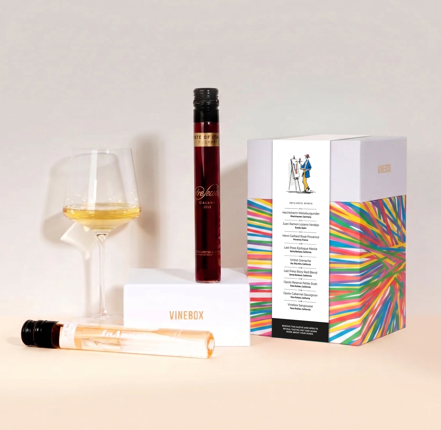 Vinebox wine subscription box with a bottle and glass on a light background